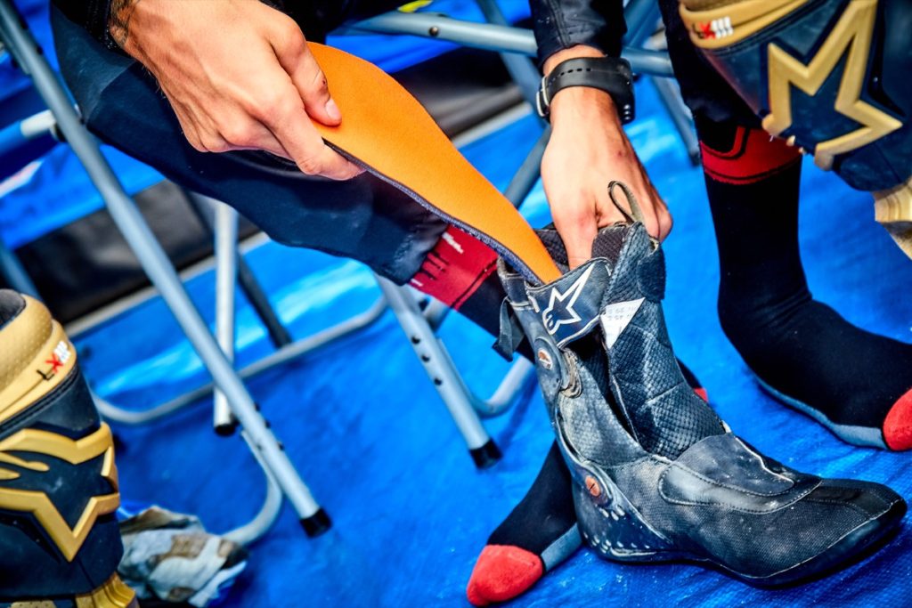 aaron plessinger using synergy footbeds inside his alpinestars boots close up